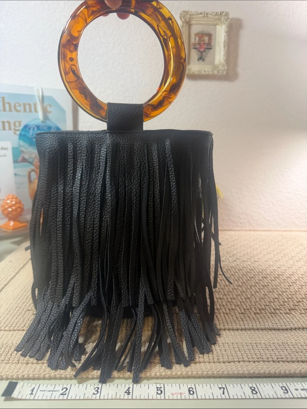 Black Fringed Wristlet with Amber Acrylic Ring Handle